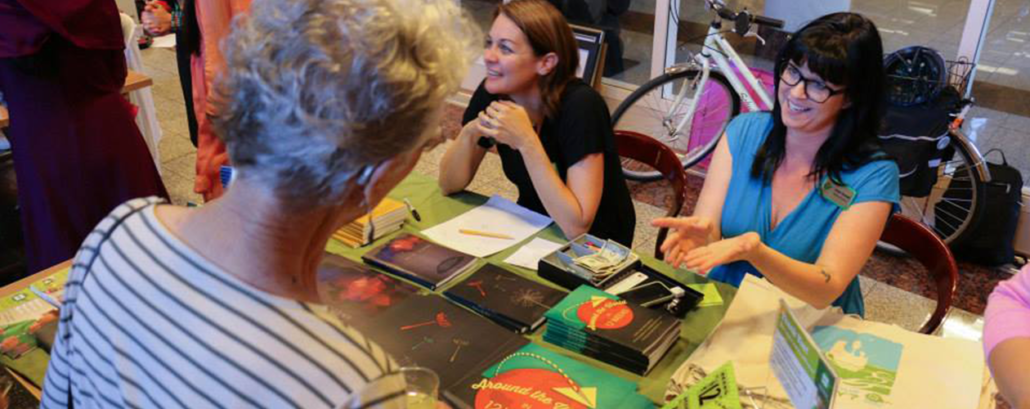 Students and teachers meeting family and friends at book party