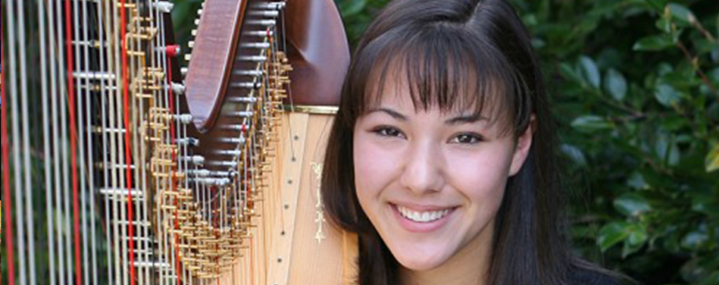 Image of Hannah Till, a student with a harp