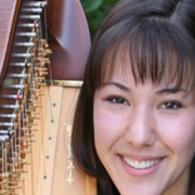 Image of Hannah Till, a student with a harp