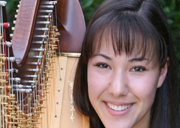 Image of Hannah Till, a student with a harp