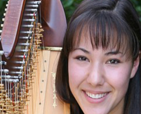 Image of Hannah Till, a student with a harp