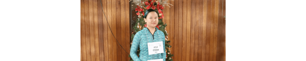 Visions Student, Chloe H., winner of the Spelling Bee