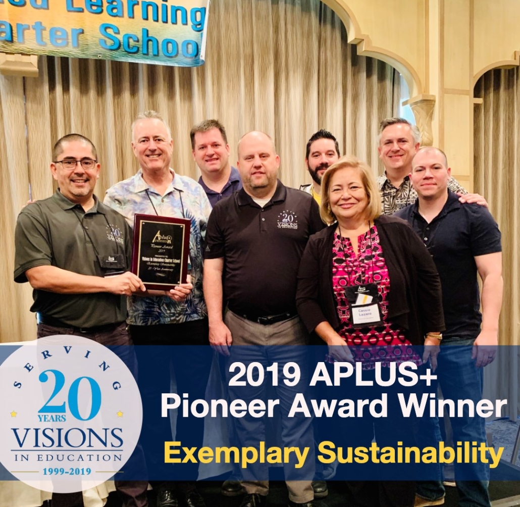 Visions staff accepts award at APLUS+ conference