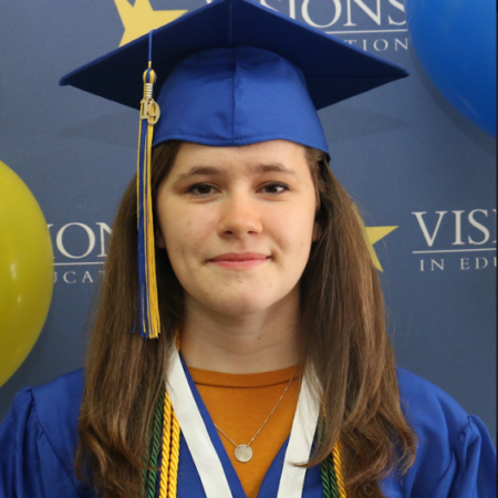 Female grad in cap and gown