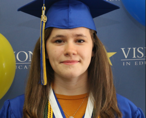 Female grad in cap and gown