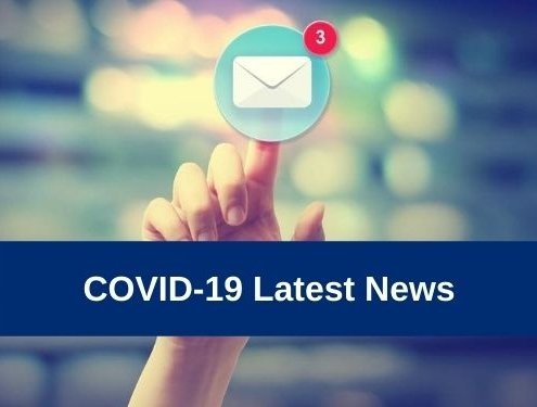 Hand pressing an email icon on blurred cityscape background with COVID-19 Latest News text overlay