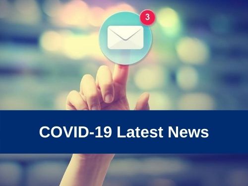 Hand pressing an email icon on blurred cityscape background with COVID-19 Latest News text overlay