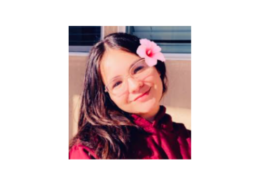 Briyannah, a female Independent Study online high school student, smiles at the camera
