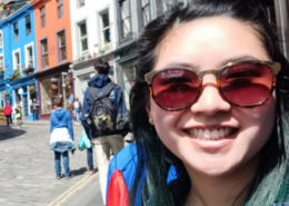 High school graduate smiles while studying abroad