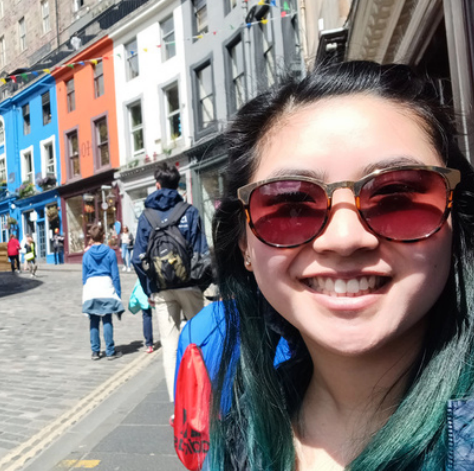 High school graduate smiles while studying abroad