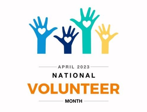 Multicolored hands raised with text that reads "April 2023 - National Volunteer Month"