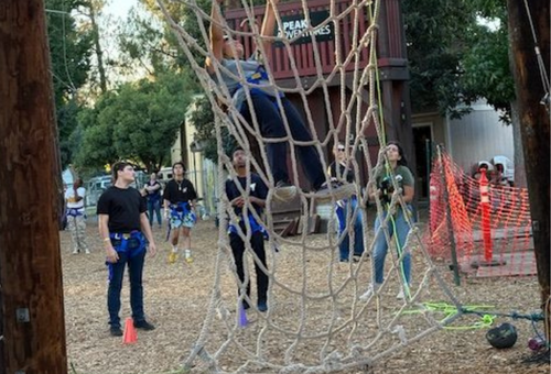 Visions students at an outdoor climbing park at Sacramento State University.