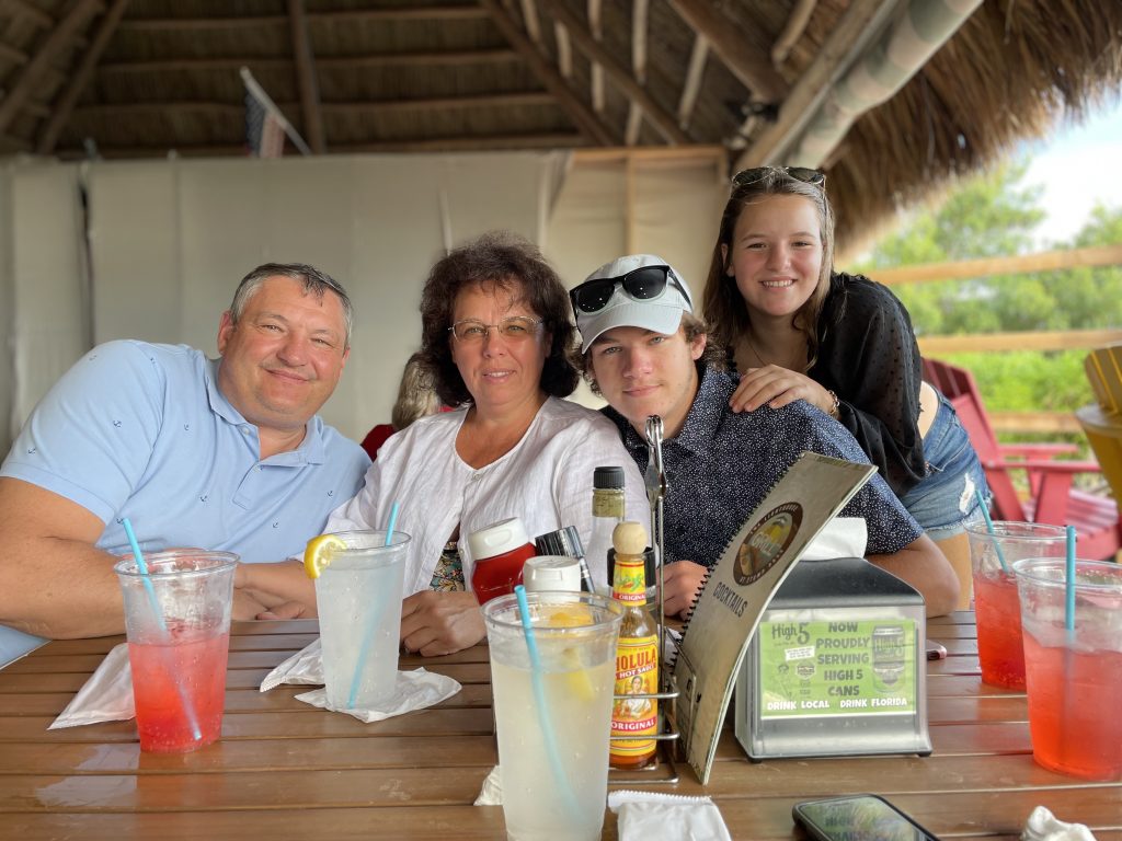 Ellie C. with her family