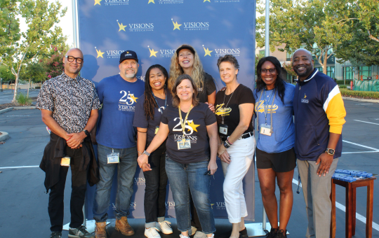 Visions staff gather for a photo after Senior Sunrise