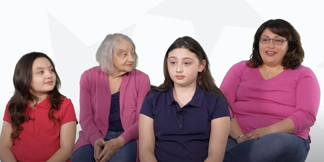 Family photo with grandmother, mother, and two daughters