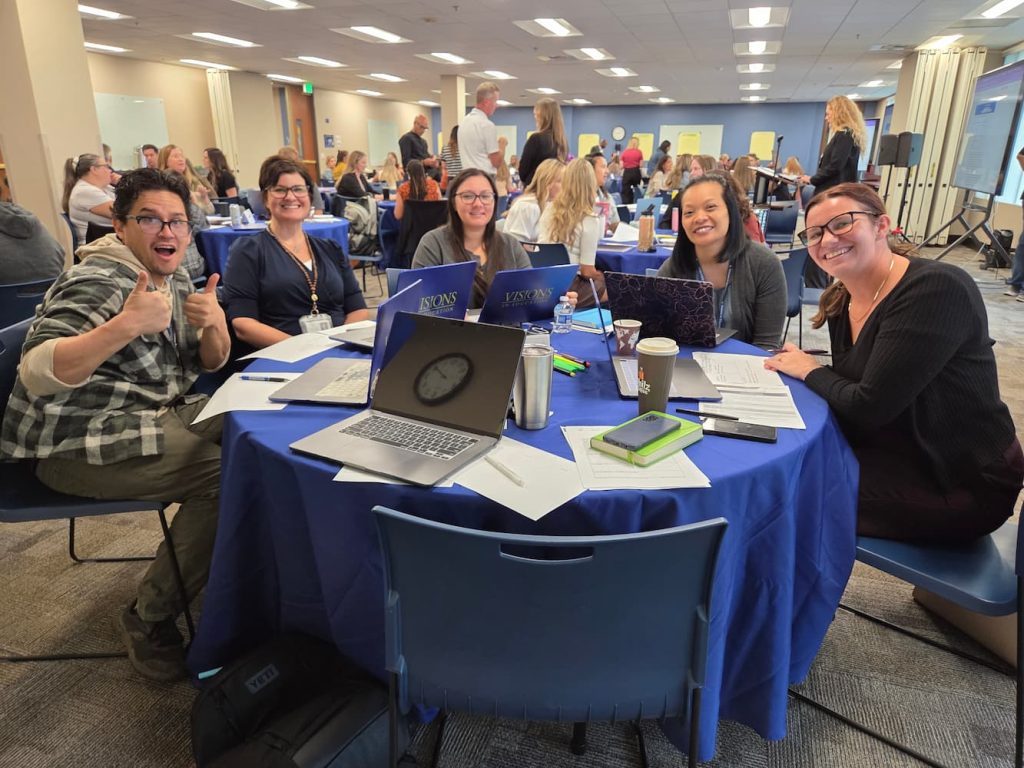 Group photo of Visions staff at a training