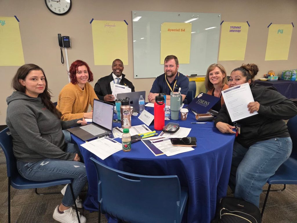 Group photo of Visions staff at a training