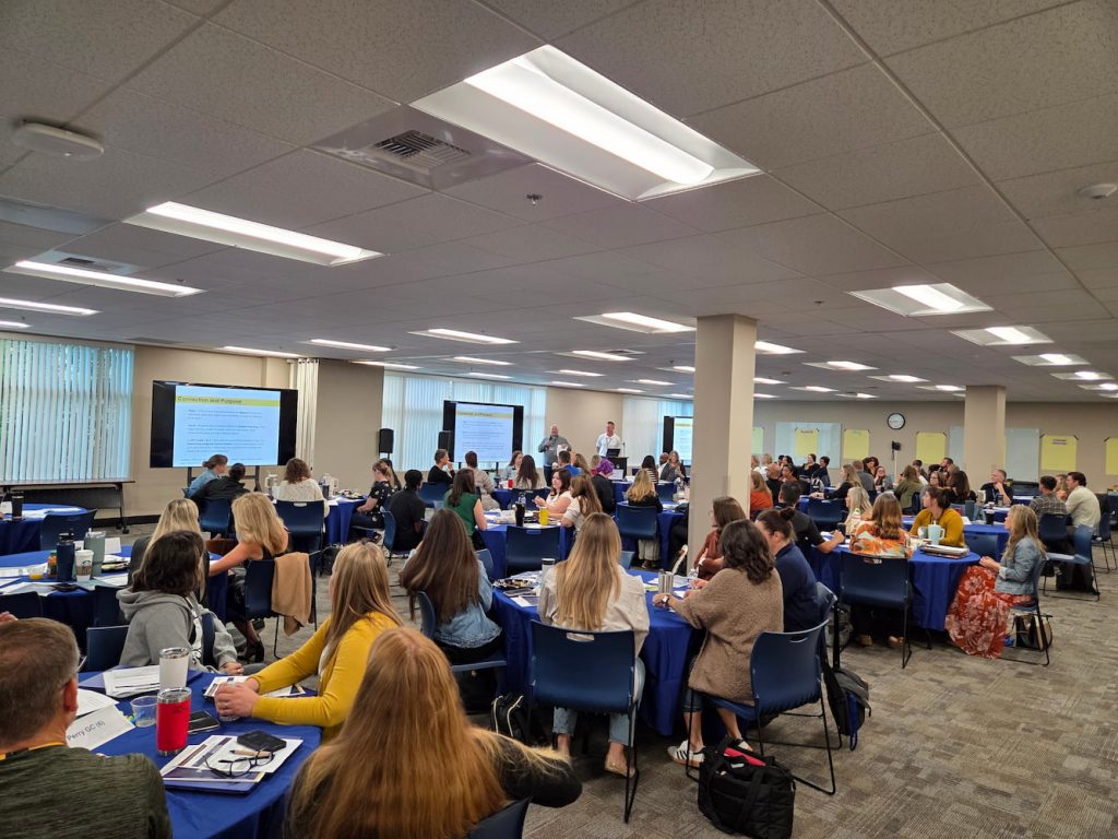 Visions staff collaborating at a professional development event