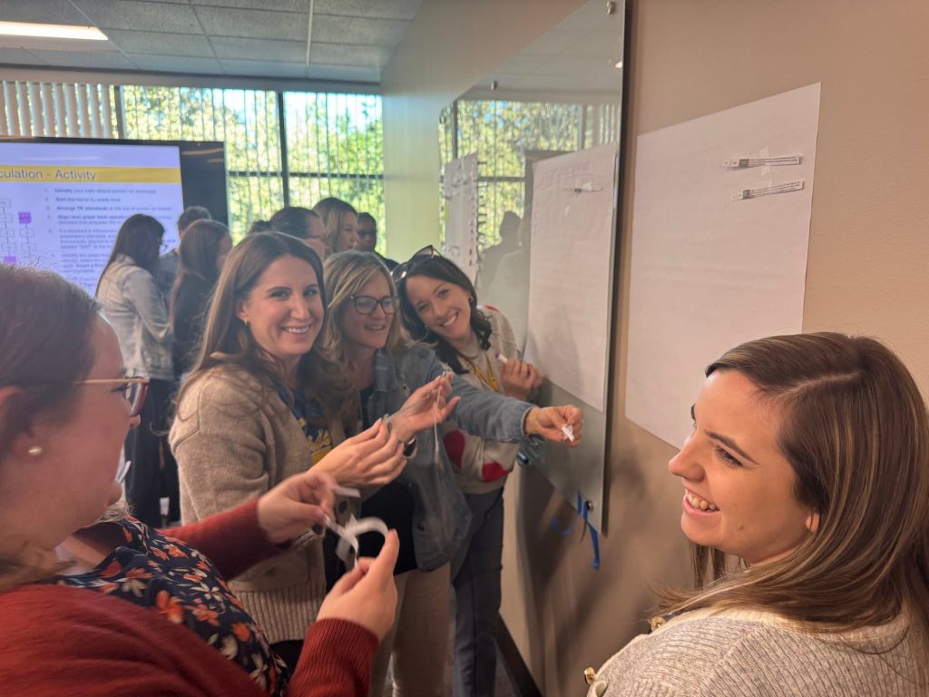 Visions staff collaborating at a professional development event