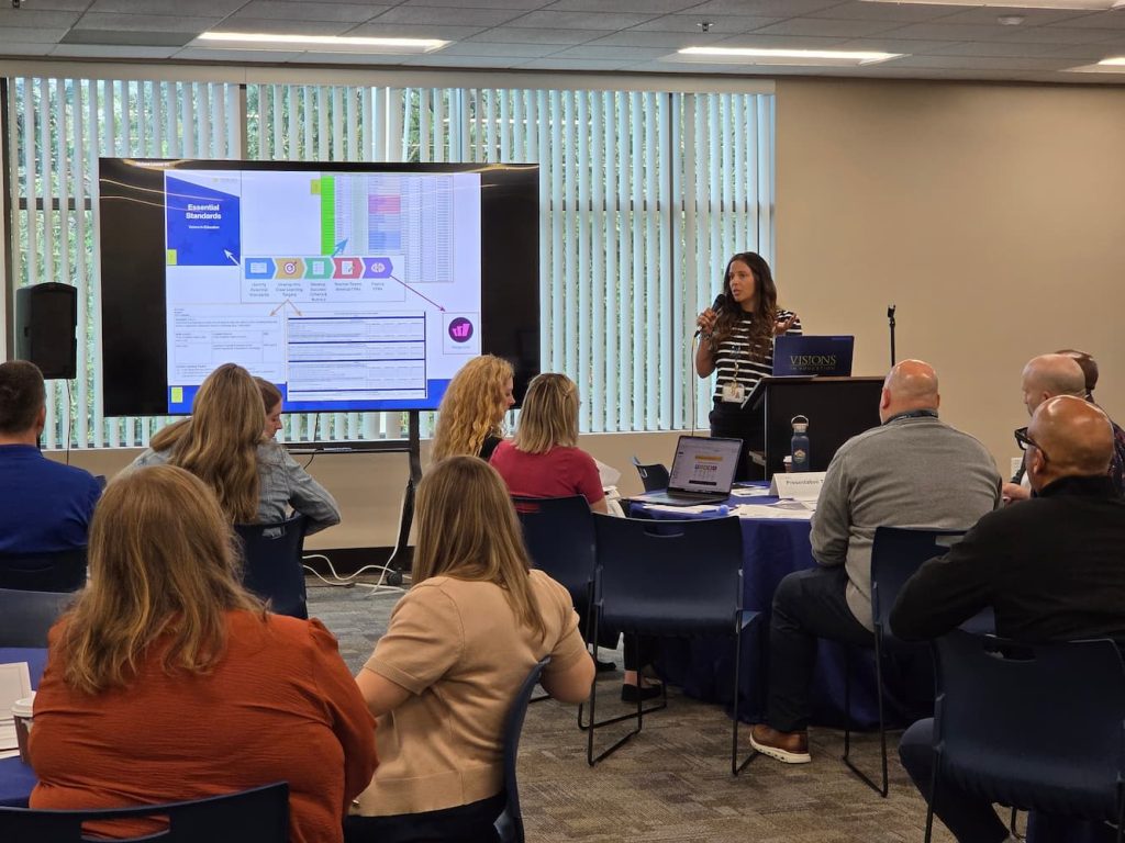 Visions staff presenting at a training