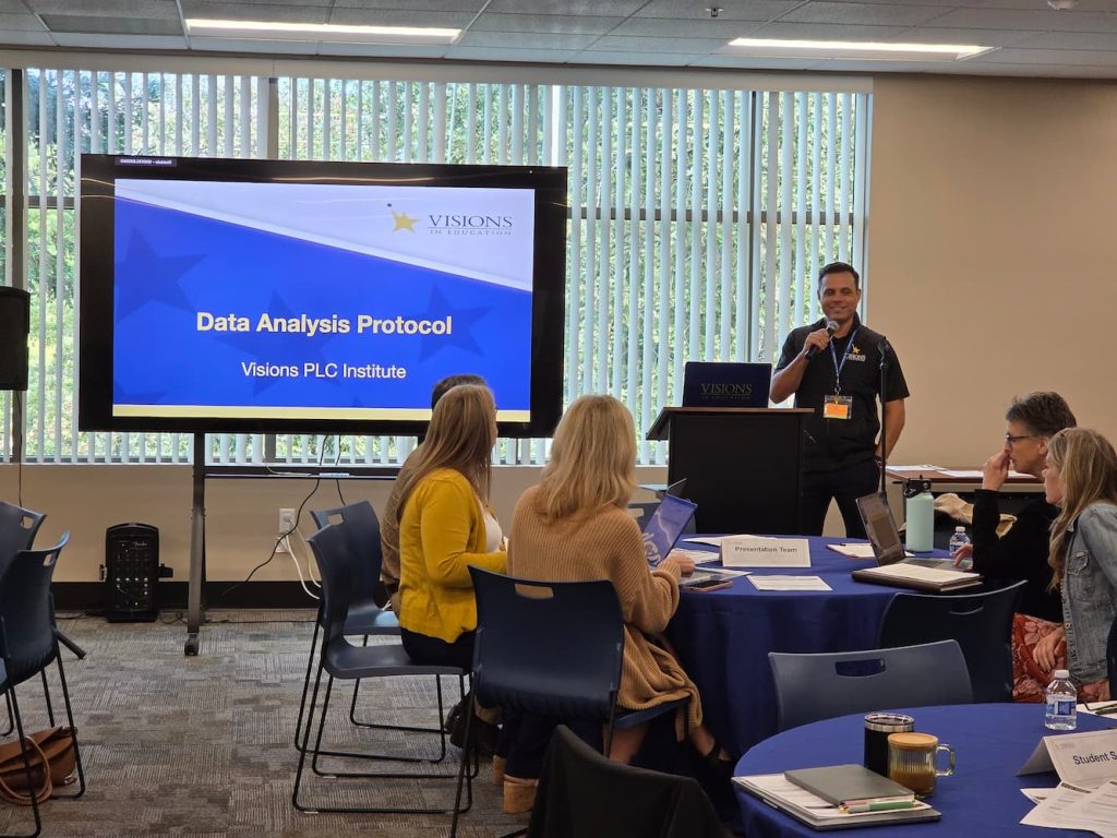 Visions staff presenting at a training