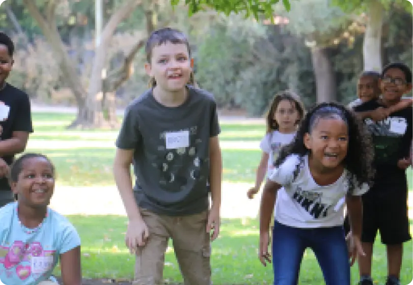 Students smiling together at a field day event
