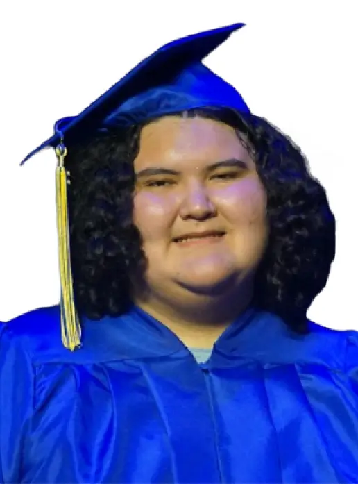 A smiling student named Jesus, with curly dark hair wearing a bright blue graduation cap and gown with a gold tassel, set against a white background.