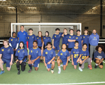Visions Indoor Soccer Team 1 poses for a picture after securing a second place finish in the playoffs.