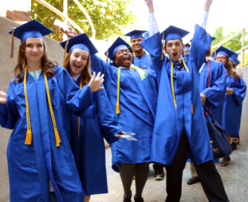 Cheerful graduates of Visions In Education